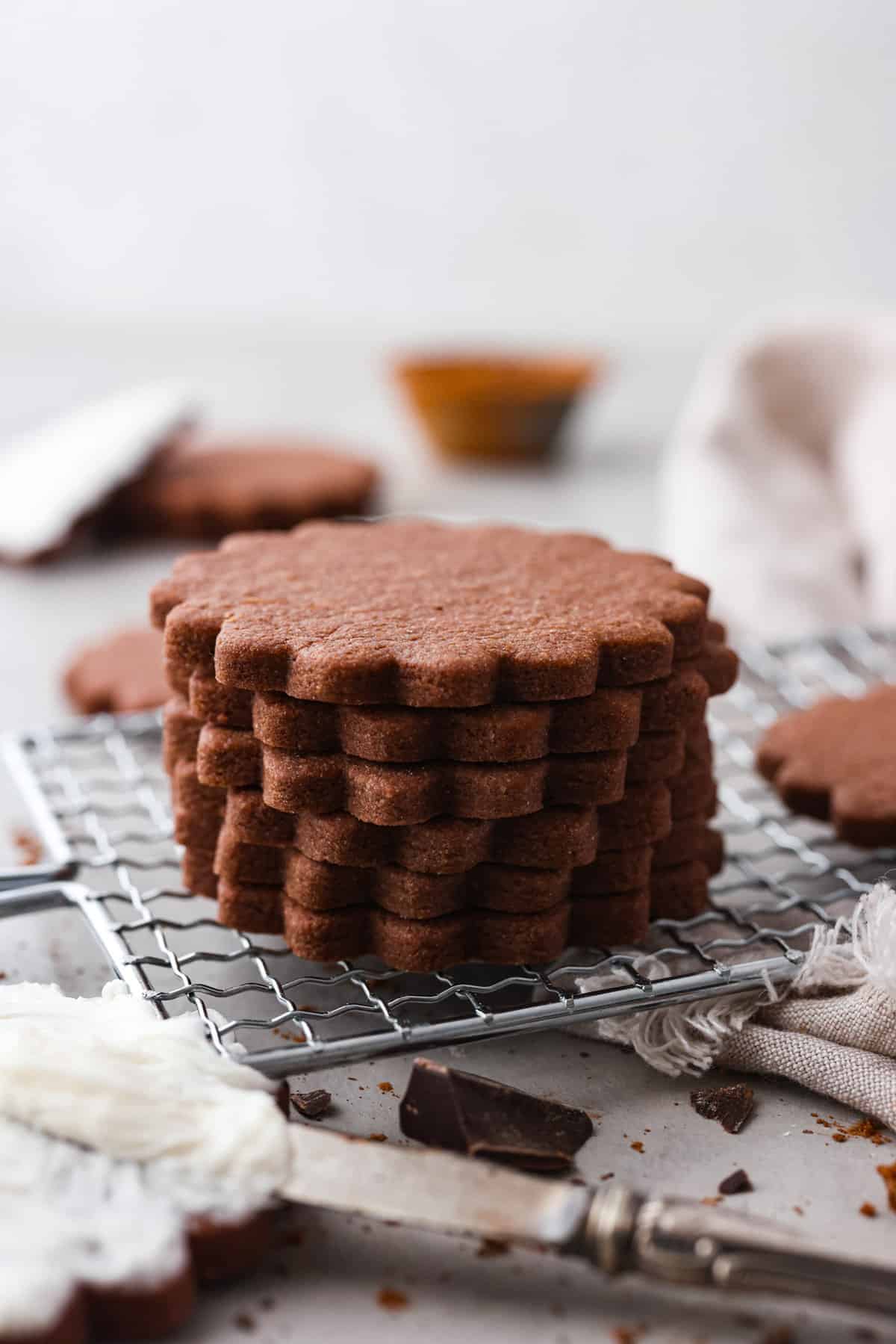 6 chocolate sugar cookies stacked on top of each other.