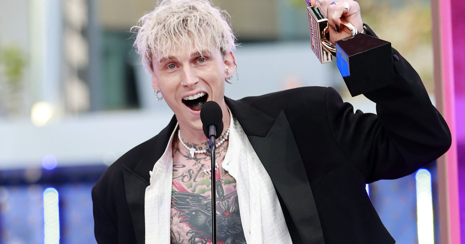 Machine Gun Kelly's Tattoos Cover Nearly Every Inch of His Body