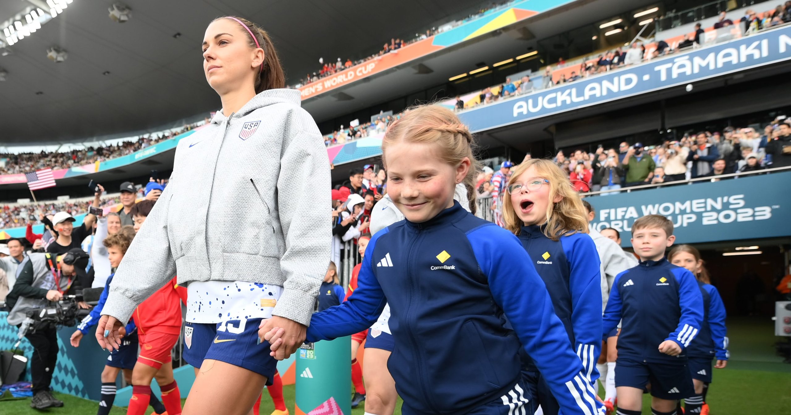 Why Soccer Teams Are Escorted Onto the Field by Kids Before a Match