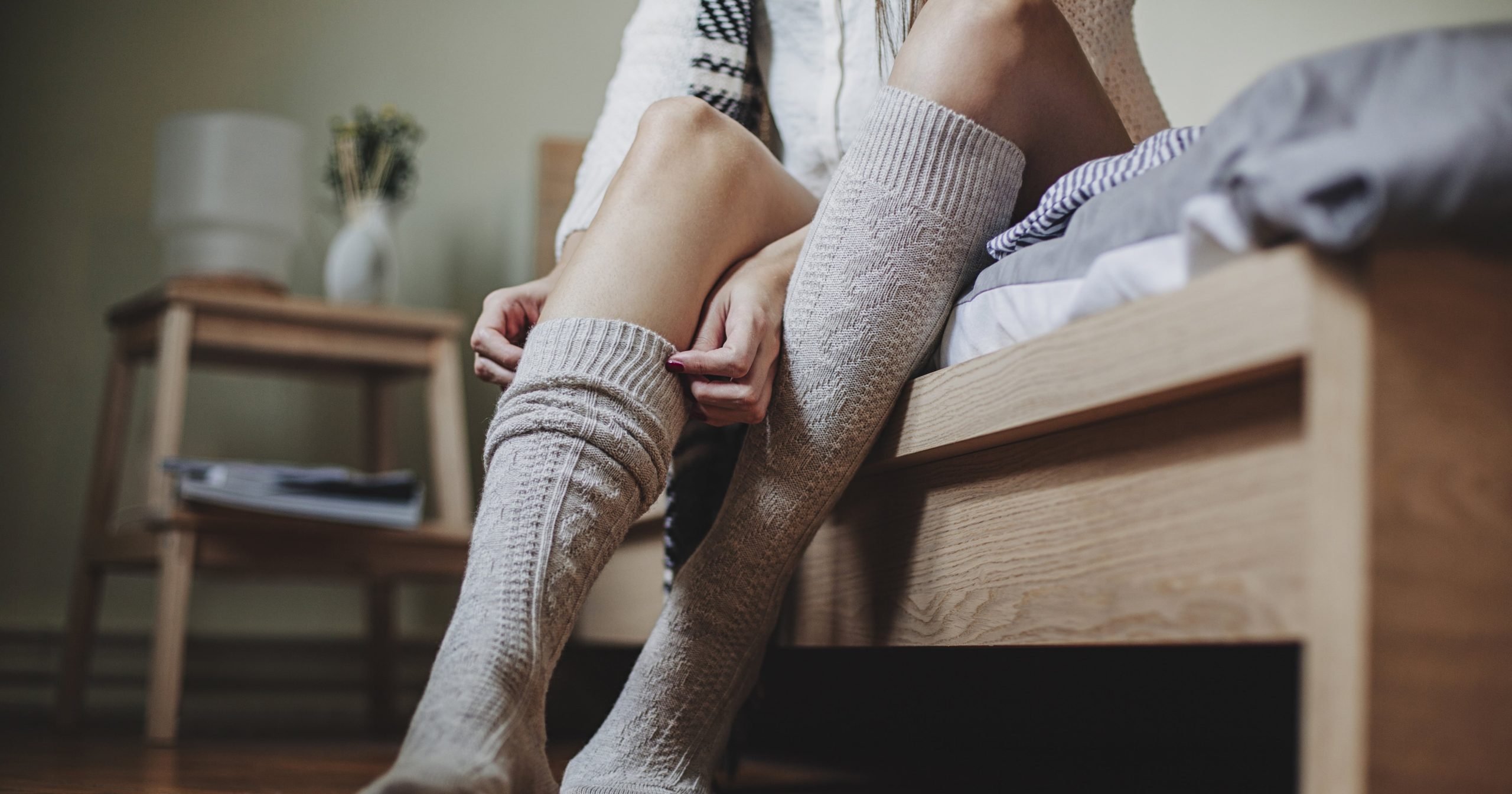 Is Wearing Socks to Bed OK? 2 Sleep Experts Weigh In