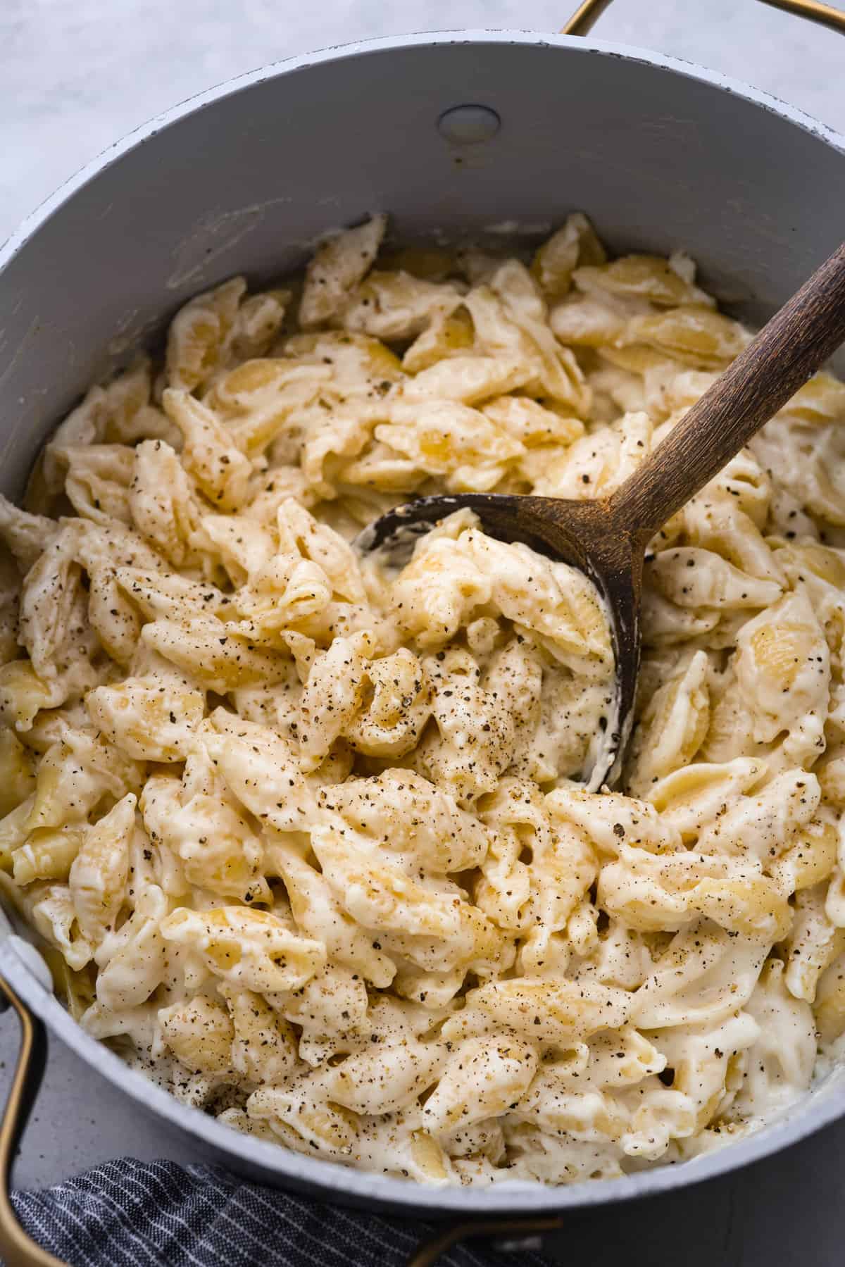 White cheddar mac and cheese in a large pot.