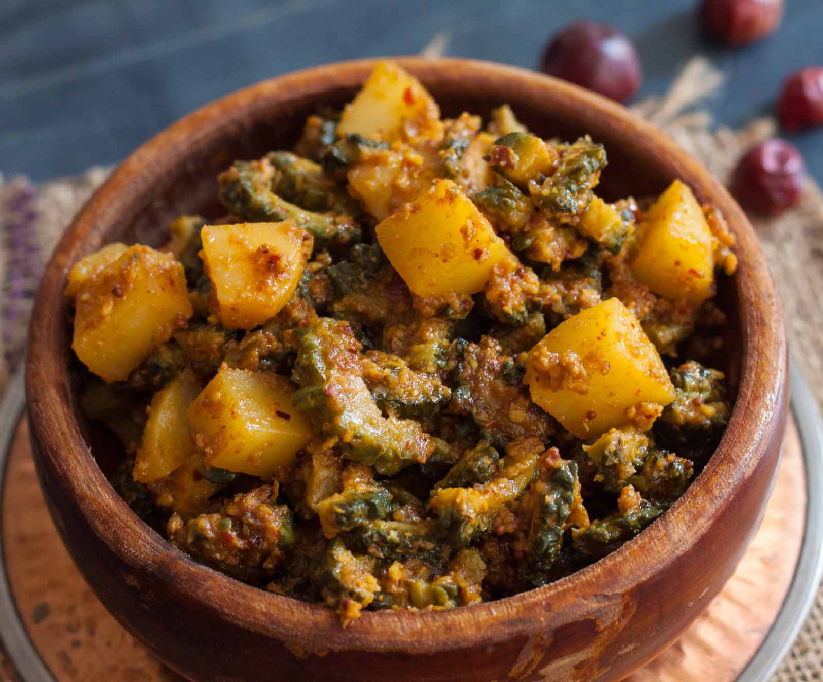 Konkani Style Karate Batate Puddi Sagle Recipe - Bitter Gourd & Potato Curry