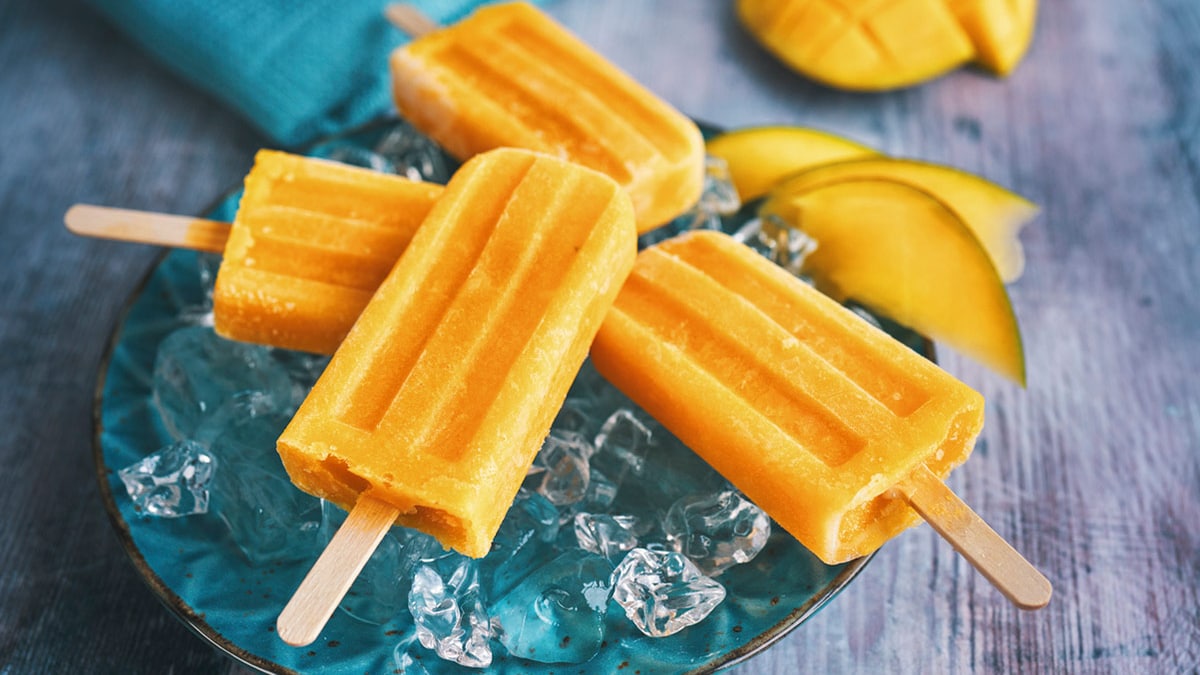 Looking For A Guilt-Free Summer Treat? Treat Yourself To These High-Protein Mango Popsicles